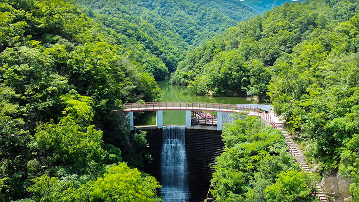 1647518463407510.jpg 2浆砌石拱形堰坝.jpg